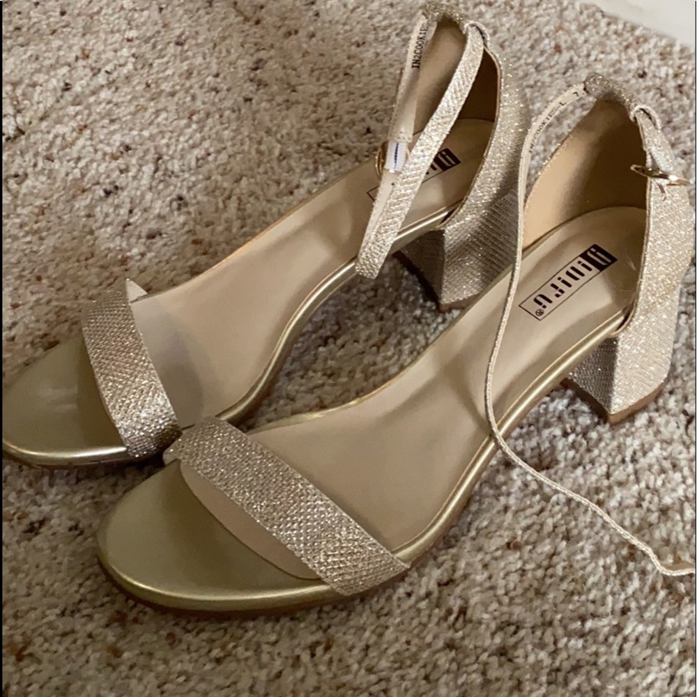 Gold high heels